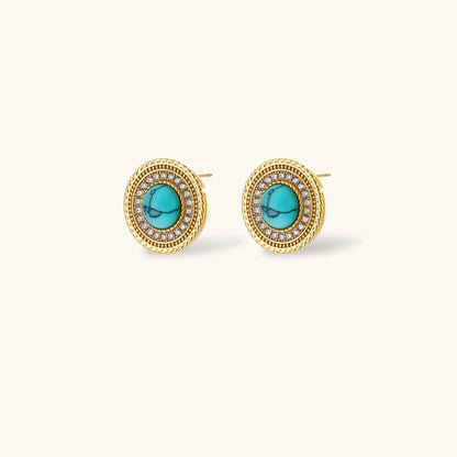 Gold-plated turquoise jewelry set with circular medallion pendant, beaded necklace, and matching stud earrings on white background