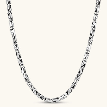 Men's antique silver Byzantine chain necklace, 6.2mm wide interlocking S-link pattern with ornate lobster clasp, 560mm length.