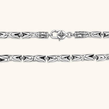 Men's antique silver Byzantine chain necklace, 6.2mm wide interlocking S-link pattern with ornate lobster clasp, 560mm length.